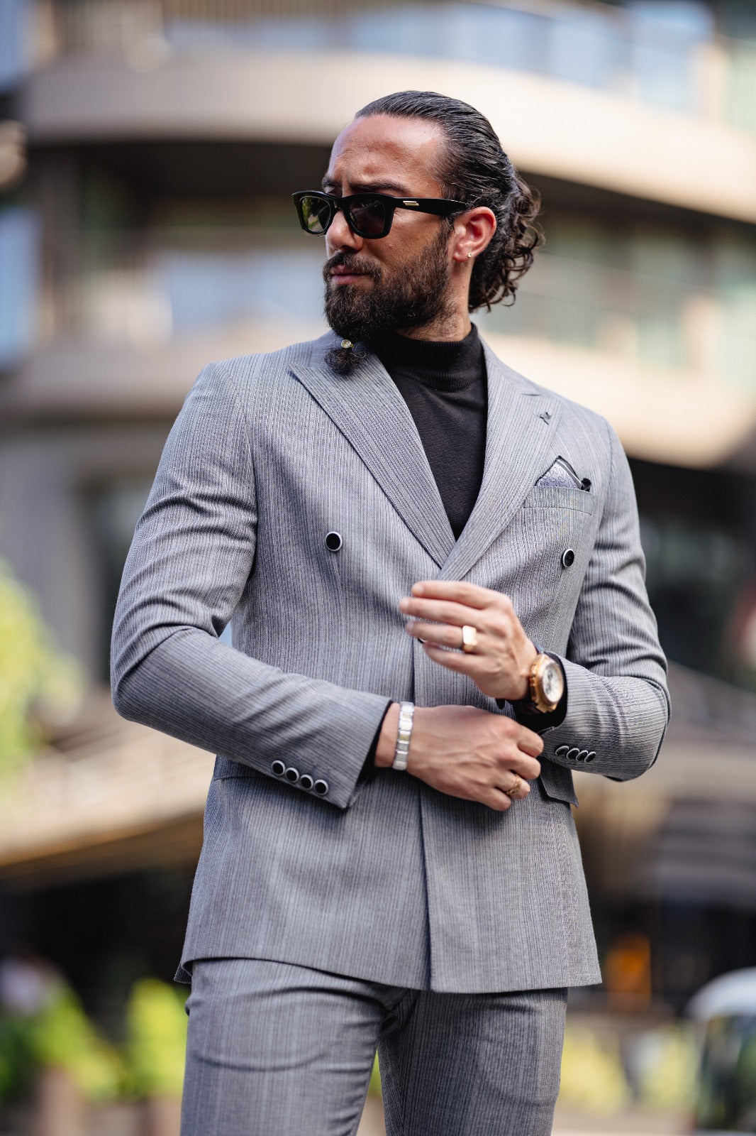A Gray Slim Fit Double Breasted Suit on display.