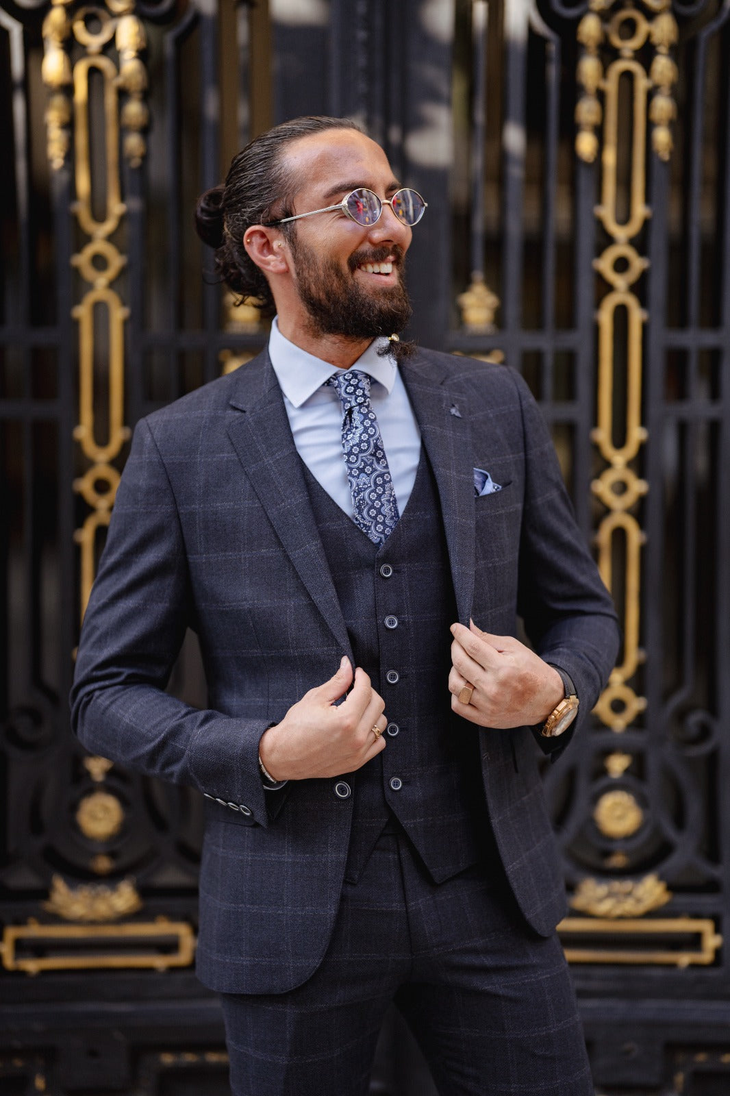 A Navy blue Slim Fit Plaid Detailed Suit on display.