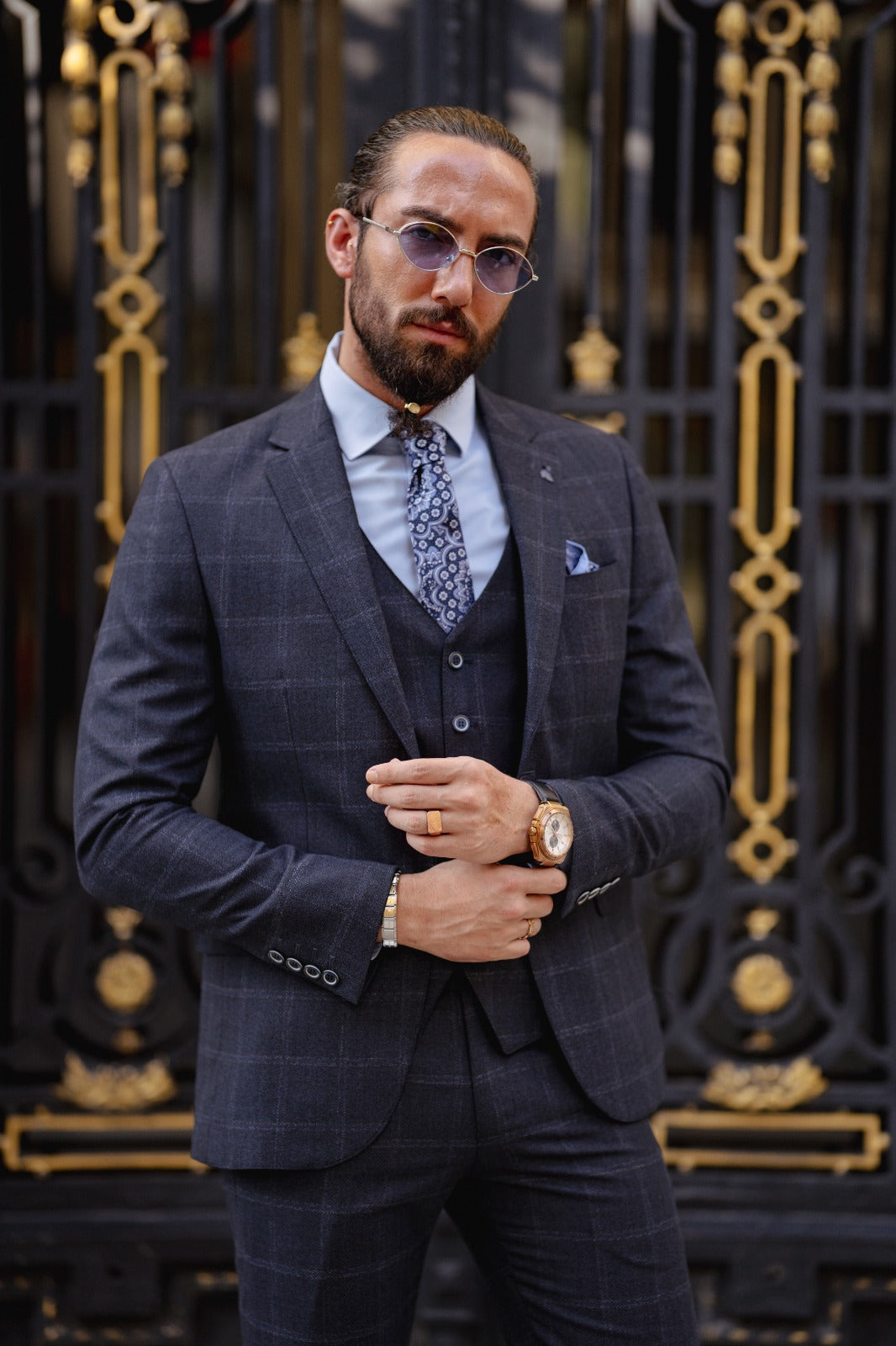 A Navy blue Slim Fit Plaid Detailed Suit on display.