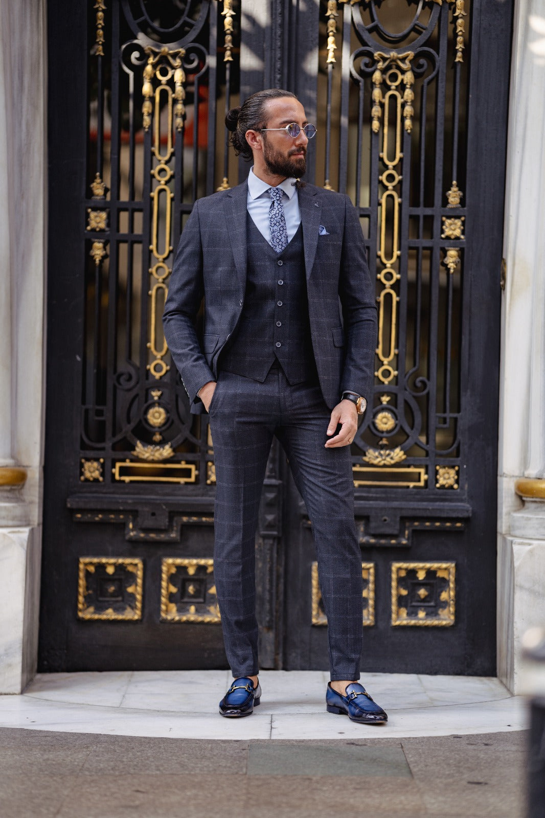 A Navy blue Slim Fit Plaid Detailed Suit on display.