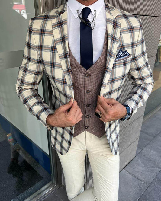 Men's patterned beige wedding suit with a modern twist.