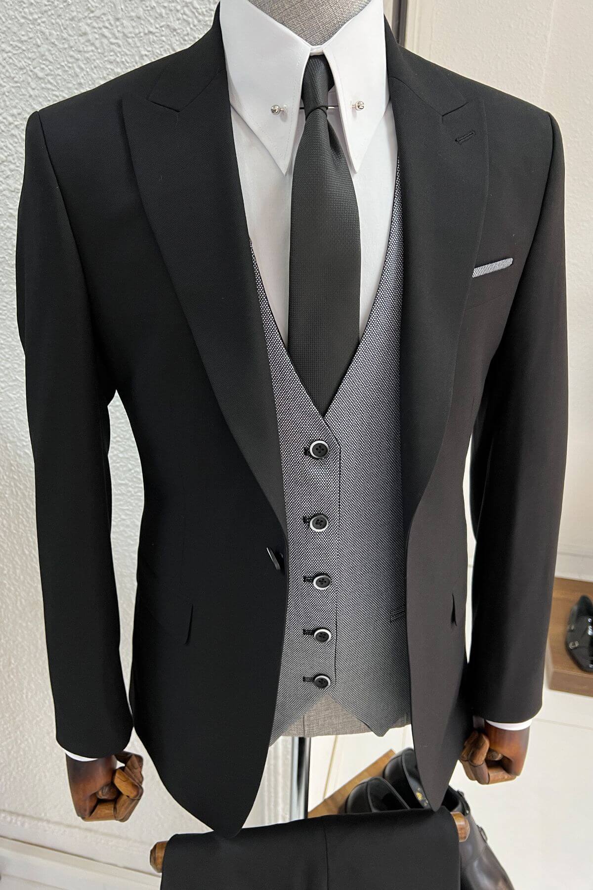 A Black and Gray Wool Suit on display 