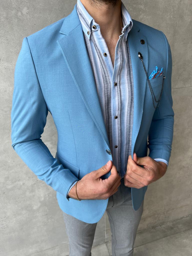 A versatile blue linen jacket suitable for casual or dressy occasion