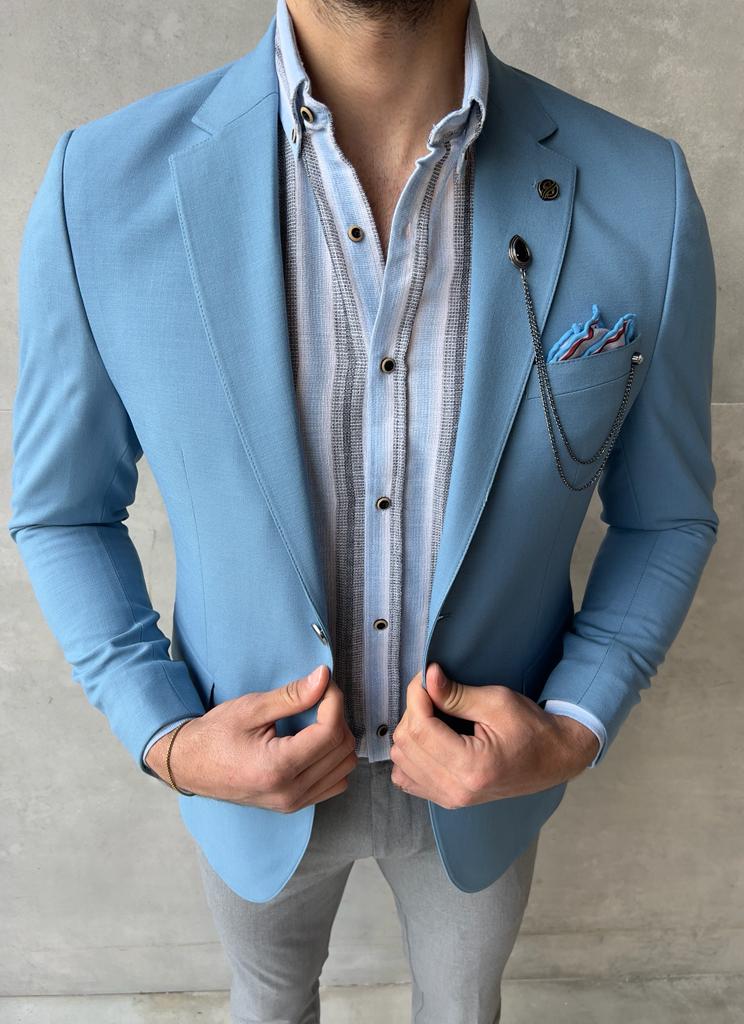 A versatile blue linen jacket suitable for casual or dressy occasion