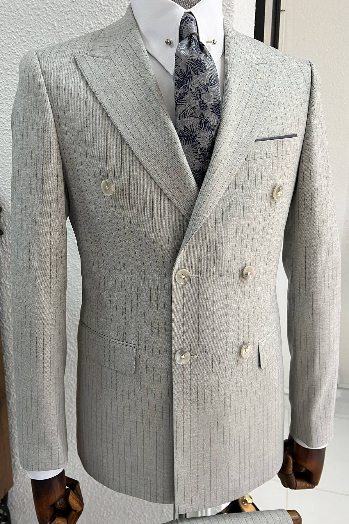A striped gray double breasted suit on display