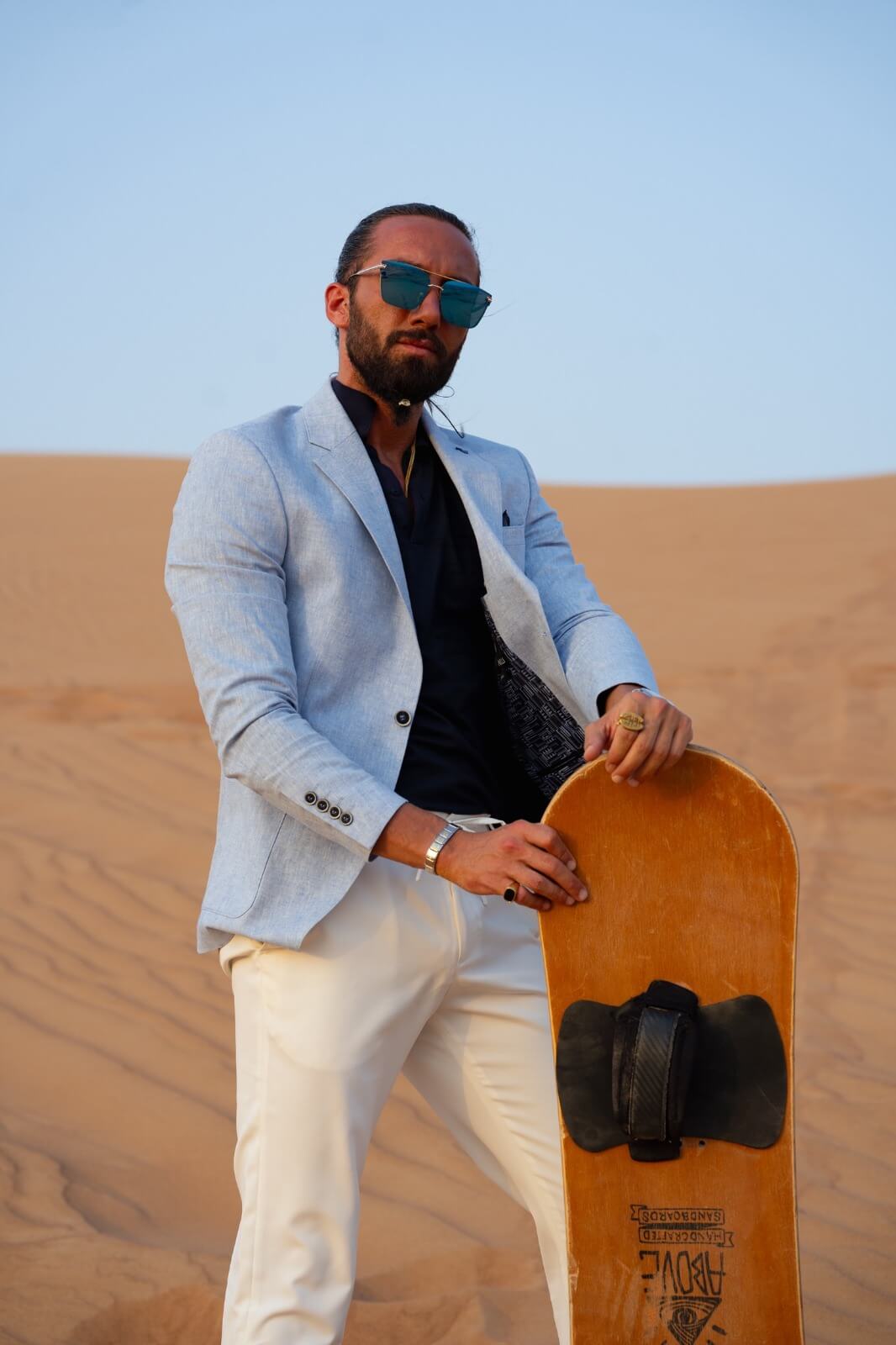 A Light navy blue Linen Jacket on display. 