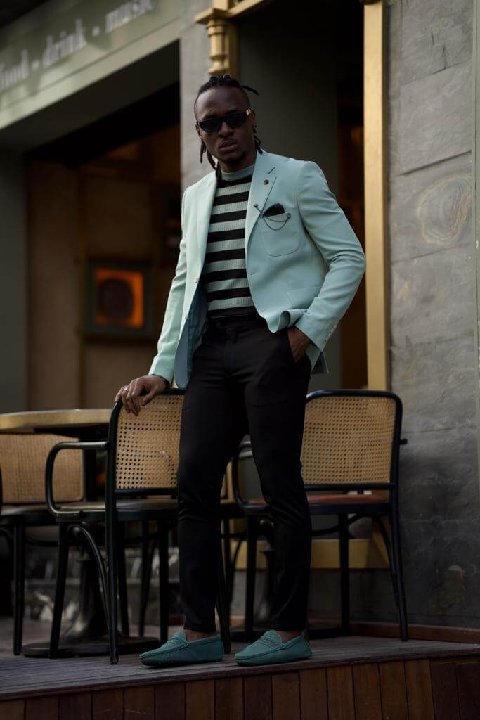 A stylish mint green jacket that adds a pop of color to any outfit